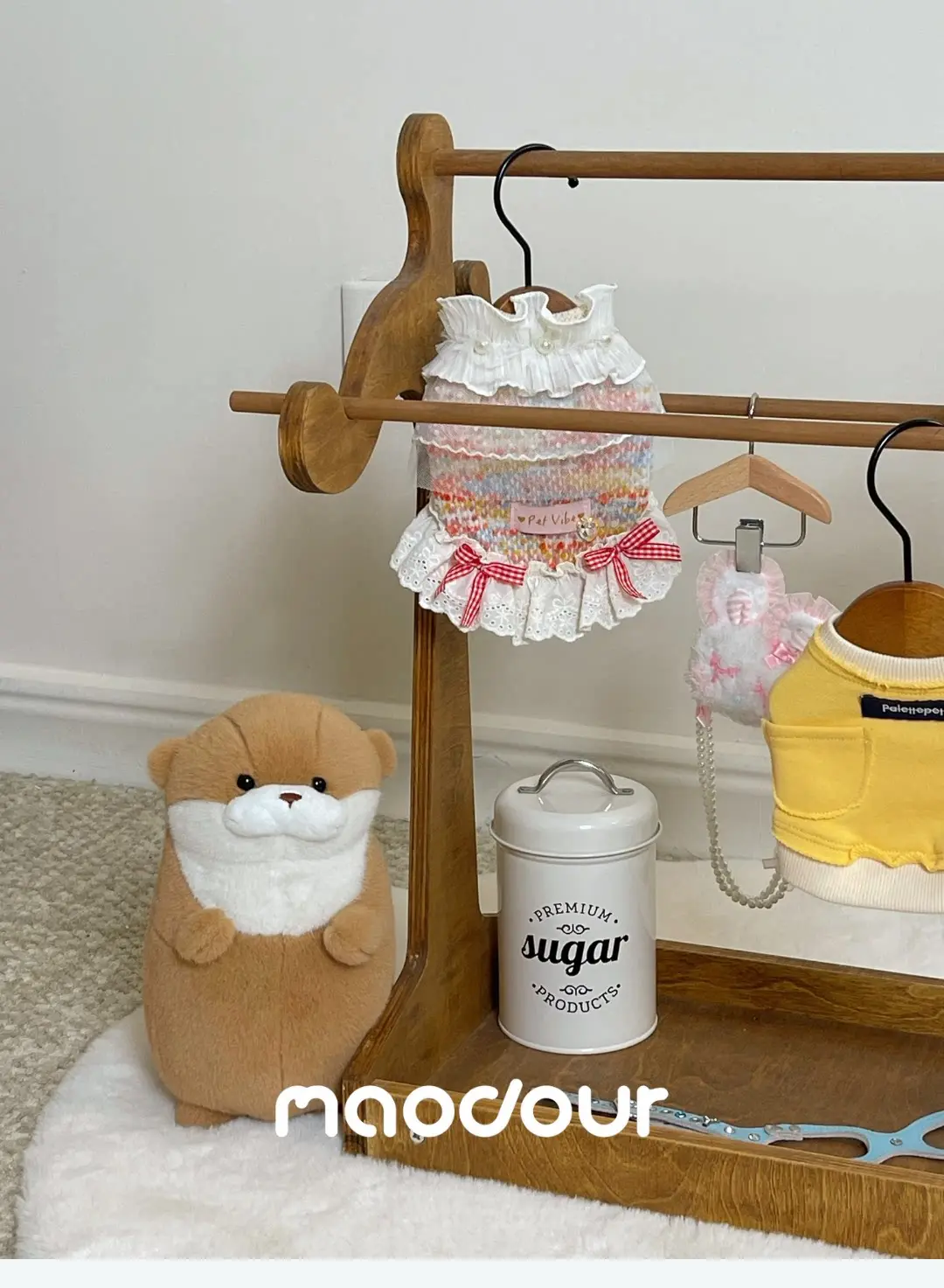 Vintage pet outfit display for a bedroom or boutique